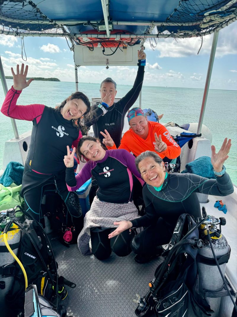 Women in Scuba Empowered group on a women-only Roatán dive retreat with Nicole Harrison