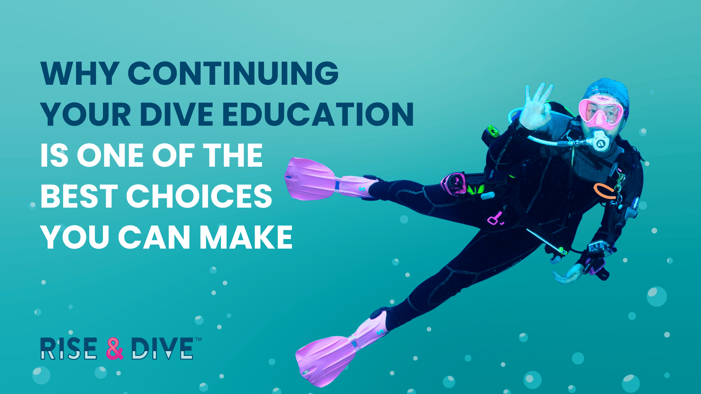 Female scuba diver giving the OK signal underwater during continuing dive education, demonstrating calm and confidence