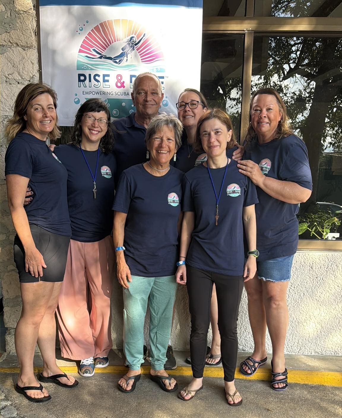 Group of women from the Rise & Dive WISE diving community during a guided dive trip experience