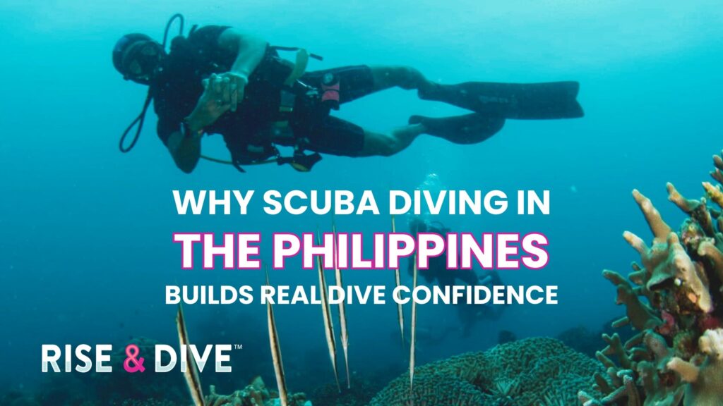 Scuba diver neutrally buoyant above a colorful coral reef while scuba diving in the Philippines Coral Triangle
