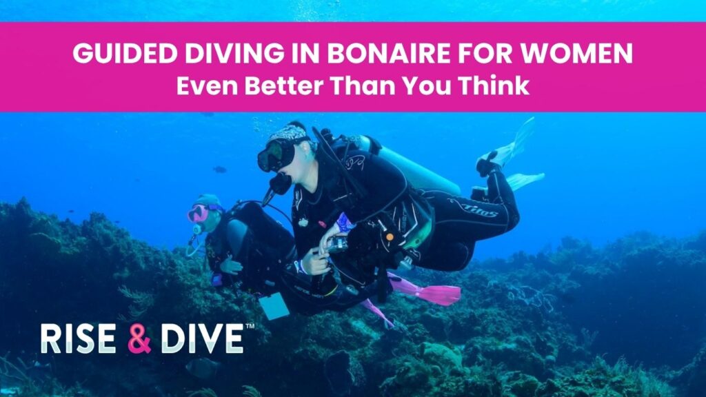 Two women scuba divers on a guided diving tour in Bonaire