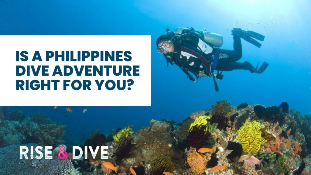 Female scuba diver hovering above a coral reef in the Coral Triangle during a Philippines dive adventure