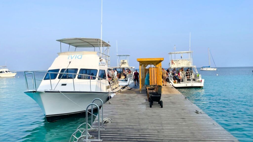 Bonaire boat diving with dive boat on clear Caribbean water