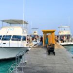 Bonaire boat diving with dive boat on clear Caribbean water