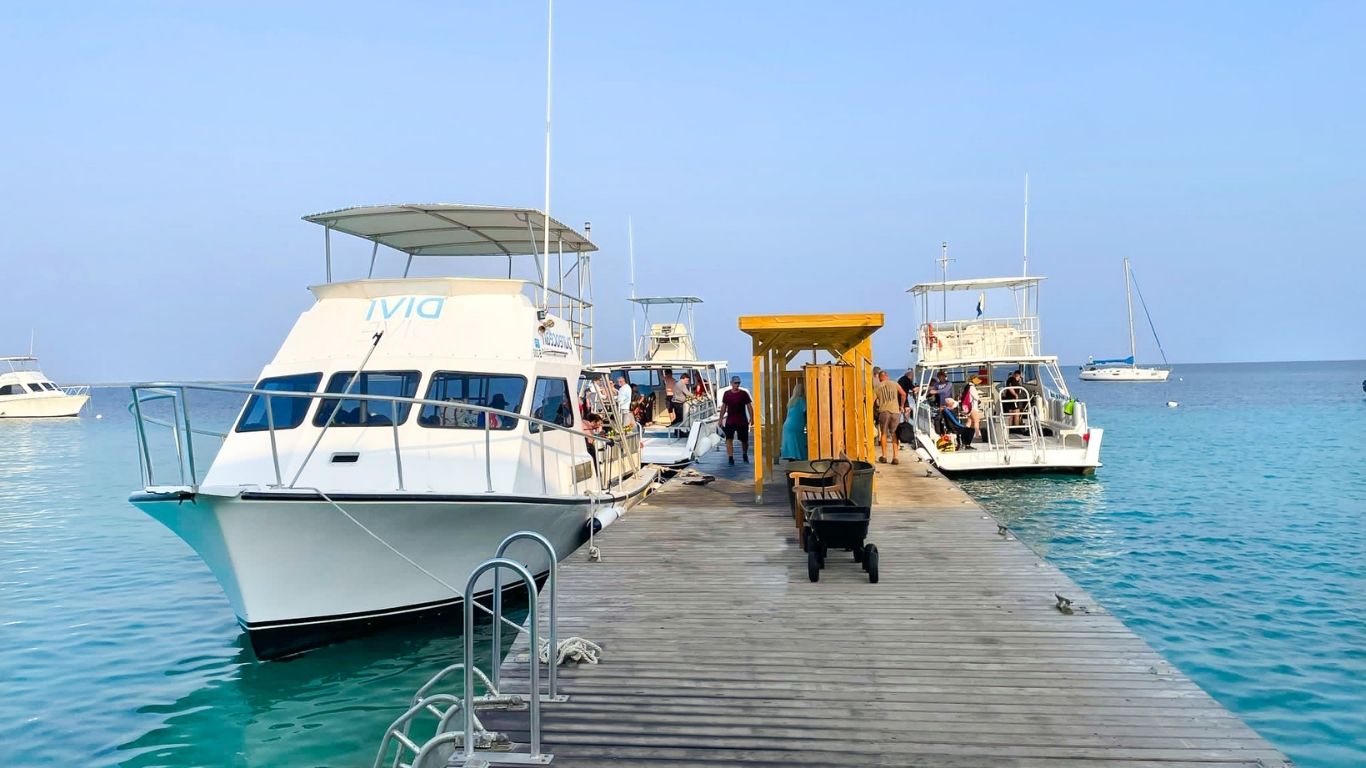 Bonaire boat diving with dive boat on clear Caribbean water
