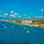 Aerial view of calm, blue water off the western shore of Cozumel, a destination for dive trip planning
