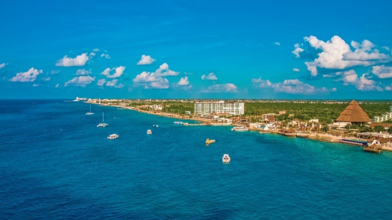 Aerial view of calm, blue water off the western shore of Cozumel, a destination for dive trip planning